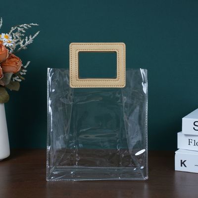 Borsa da spiaggia trasparente in PVC con maniglia in pelle