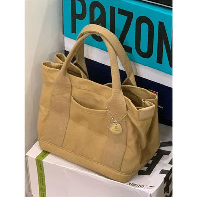 Logo personalizzato Borsa da mano di grande capacità per studenti universitari OEM / ODM e perfetta per la spiaggia