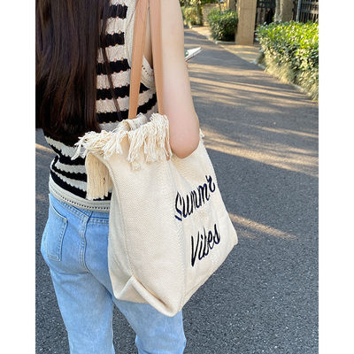 Borsa da mano di tela con modello di struzzo ideale per escursioni estive e shopping.