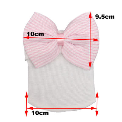 Cappello da bambino in lana a maglia con grande arco in colore e modello personalizzati a maglia