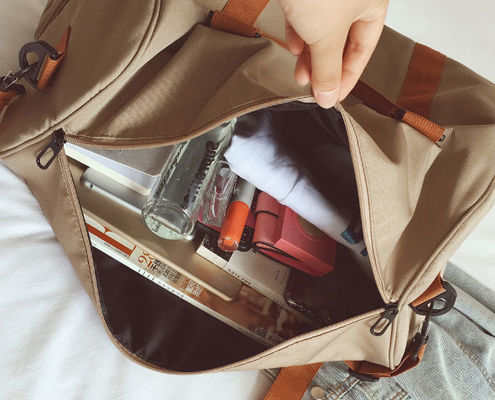 Modello di filo Logo personalizzato Borsa da bagaglio pieghevole per viaggi a grande capacità impermeabile