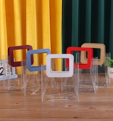 Logo personalizzato accettato PVC sacchetto di plastica trasparente con manico a taglio a stampo