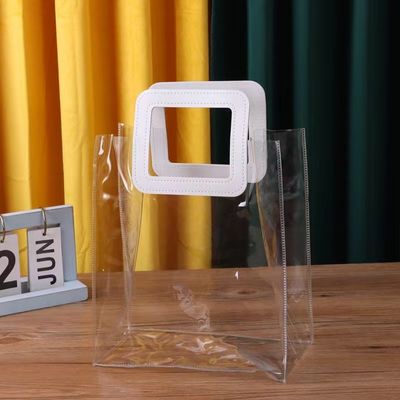 Logo personalizzato accettato PVC sacchetto di plastica trasparente con manico a taglio a stampo