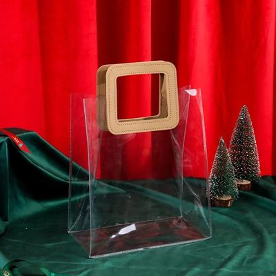 Logo personalizzato accettato PVC sacchetto di plastica trasparente con manico a taglio a stampo