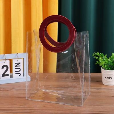 Logo personalizzato accettato PVC sacchetto di plastica trasparente con manico a taglio a stampo