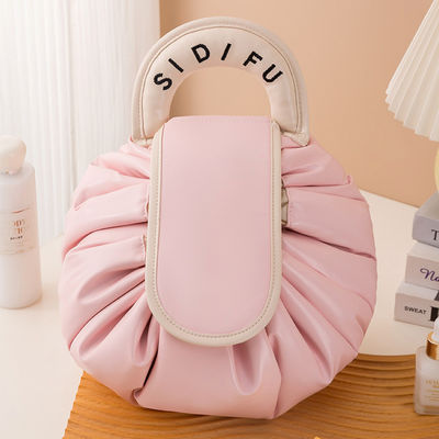Disegno del logo personalizzato Sacchetto di trucco in PVC Modello solido Tipo Stringa di disegno Busta da viaggio per toiletteria