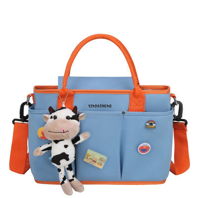 Borsa organizzatrice per bambini in passeggino a colori personalizzati per pannolini e articoli essenziali