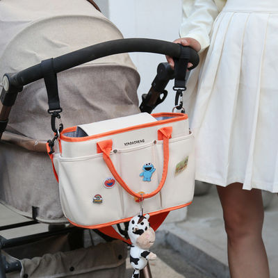 Borsa organizzatrice per bambini in passeggino a colori personalizzati per pannolini e articoli essenziali