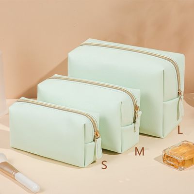 Borsa igienica in pelle vegana con chiusura a cerniera in colore personalizzato per viaggi e cosmetici