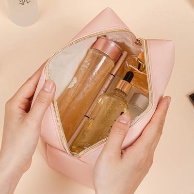 Borsa igienica in pelle vegana con chiusura a cerniera in colore personalizzato per viaggi e cosmetici