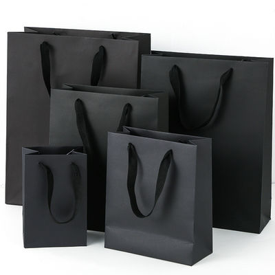 Logo stampato su misura Luxury Boutique Shopping Sacchetti regalo cartacei Imballaggi regalo personalizzati