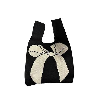 Disegno di sacchetto di tote personalizzato tessuto di cotone organico a maglia con nodo di arco ecologico