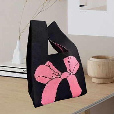 Disegno di sacchetto di tote personalizzato tessuto di cotone organico a maglia con nodo di arco ecologico