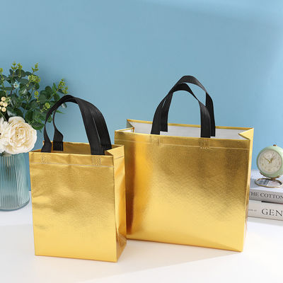 Borsa da shopping laminata non tessuta a colori personalizzati con colore dorato e lunghezza del manico