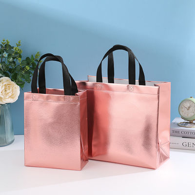 Borsa da shopping laminata non tessuta a colori personalizzati con colore dorato e lunghezza del manico