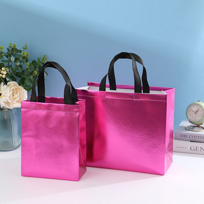 Borsa da shopping laminata non tessuta a colori personalizzati con colore dorato e lunghezza del manico