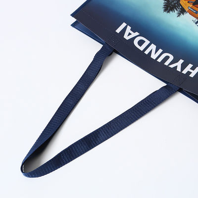 Borsa non tessuta laminata eco-friendly di medie dimensioni per boutique di shopping personalizzato