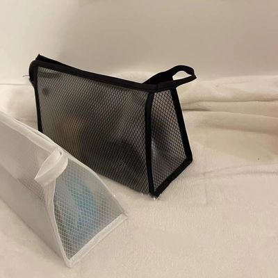 Tasca di trucco in maglia di nylon semplice personalizzata per la conservazione di articoli igienici e cosmetici in colore nero
