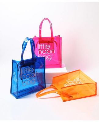 Cassa inclusa Logo personalizzato Sacchetto trasparente trasparente in PVC con cerniera e tasca