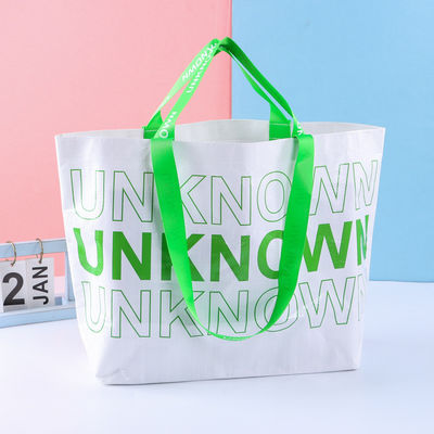 Stampa su misura Sacchetti di shopping laminati in PP tessuti con loghi personalizzati in colore personalizzato