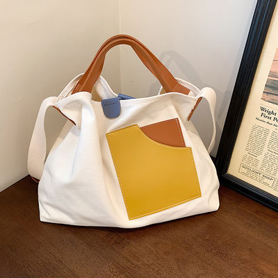 2023 Design Sense Borsa da abbigliamento per donne Logo personalizzato Accepted Canvas Lining Material