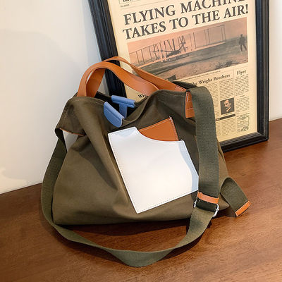 2023 Design Sense Borsa da abbigliamento per donne Logo personalizzato Accepted Canvas Lining Material