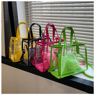 Rivestimento in nylon accettabile OEM/ODM Sacchetti da shopping in PVC trasparente con maniglia colorata