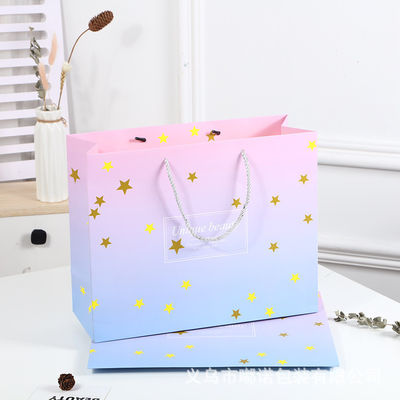 Borsa da shopping stampata su misura di cartone Borsa regalo di carta kraft bianca di lusso con maniglia a nastro