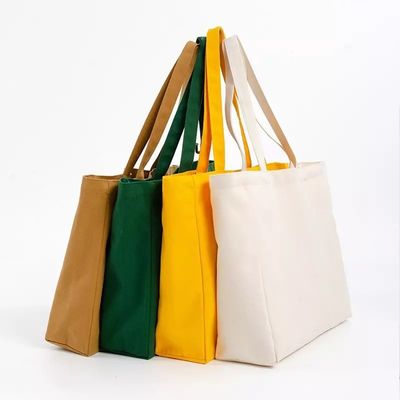 Borsa da shopping per donne con tasche e disegni di lettere