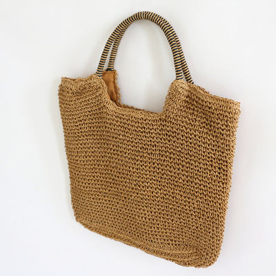 Materiale di rivestimento in poliestere Fabbricazione a mano Borsa da spalla di paglia femminile per spiaggia estiva Borsa grande