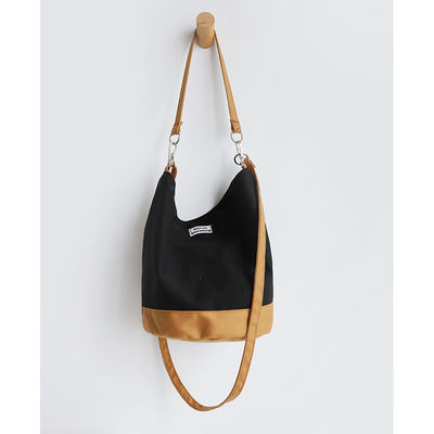 Borsa di cotone a fondo rotondo per acquisti alla moda e funzionali