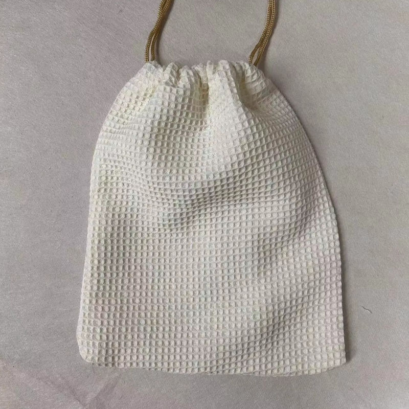 Prodotto OEM/ODM Accepted Blank Waffle Weave Cosmetic Storage Bag per le esigenze di cura della pelle