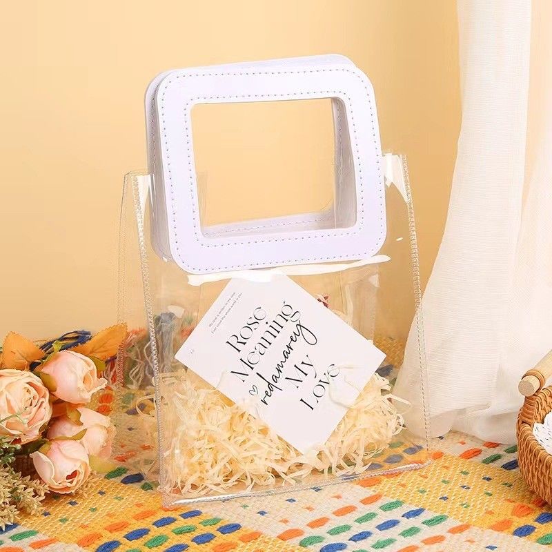 Borsa da spiaggia trasparente in PVC con maniglia in pelle