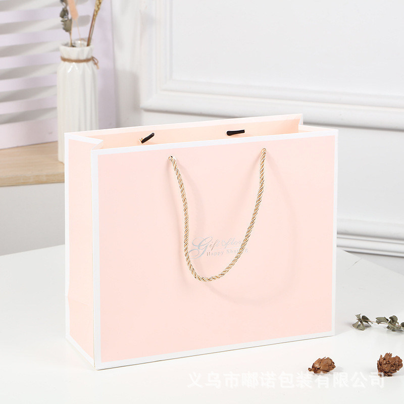 Borsa da shopping stampata su misura di cartone Borsa regalo di carta kraft bianca di lusso con maniglia a nastro