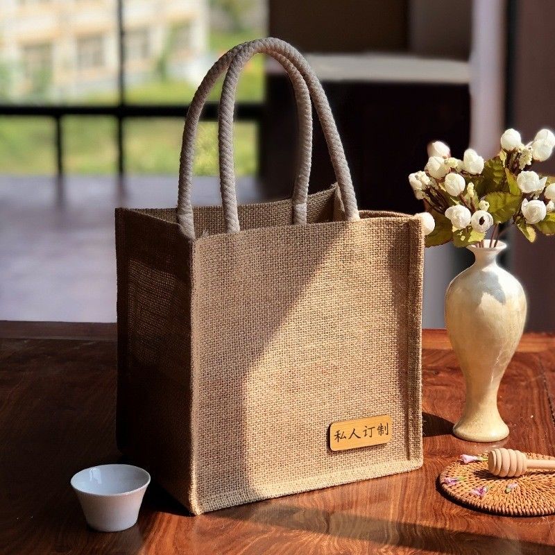 Sacchetti di giuta ecologici con logo stampato personalizzato e maniglie in pelle